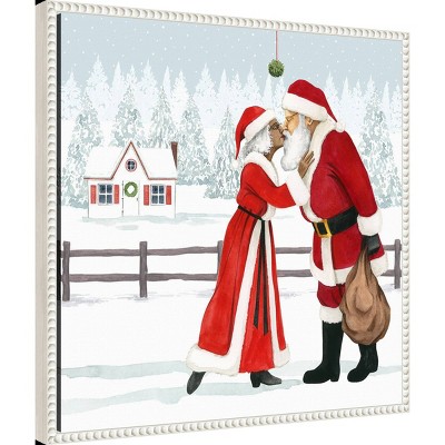 Santa and Mrs. Claus Kiss Under Mistletoe Framed Canvas Print