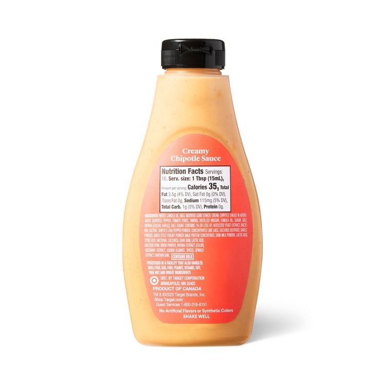 A bottle of creamy chipotle sauce with a black cap, featuring a nutrition facts label showing 35 calories per 1 tablespoon (15 ml) serving.