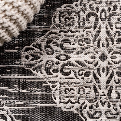 Black and Ivory Medallion Flat Woven Indoor/Outdoor Rug