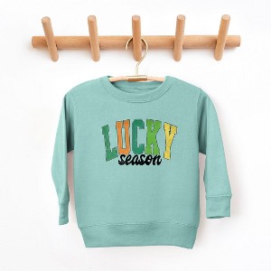The Juniper Shop Lucky Season Toddler Graphic Sweatshirt - 1 of 3