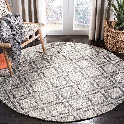 Hand-Tufted Elegance Round 59" Gray Wool Area Rug