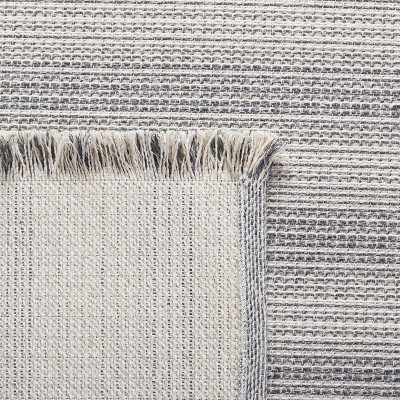 Augustine Ivory/Dark Grey Synthetic Boho-Mod 4'x6' Area Rug