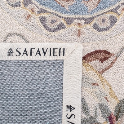 Blue Floral Hand-Hooked Wool Area Rug 5'3" x 8'3"