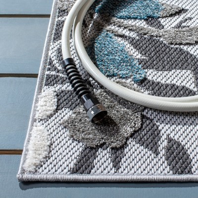 Beige and Blue Floral Synthetic Indoor/Outdoor Rug