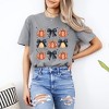 Simply Sage Market Women's Coquette Black Bow Pumpkin Chart Short Sleeve Garment Dyed Tee - 2 of 4