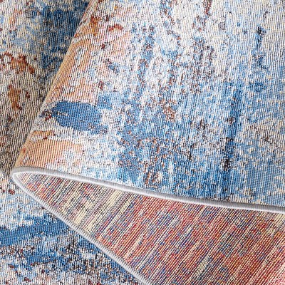 Ivory Abstract Synthetic 4' x 6' Area Rug