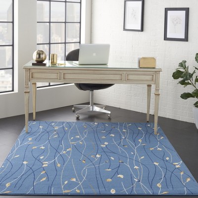 Light Blue Floral Synthetic 5' x 7' Area Rug