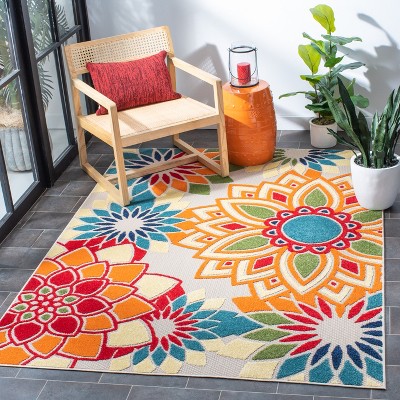 Ivory and Orange Floral Synthetic Easy Care Rug, 5' 3" x 7' 7"