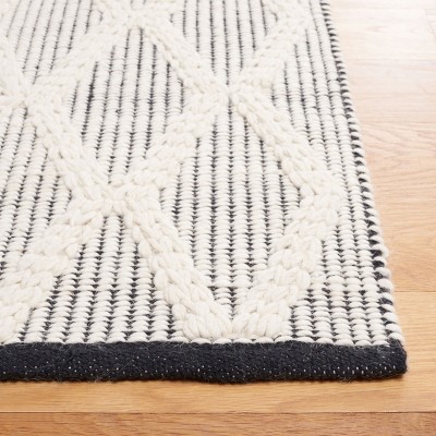 Handmade Black and Ivory Wool Diamond 6' x 9' Area Rug
