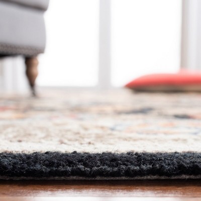 Black Floral Hand-Hooked Wool Area Rug with Ivory Border