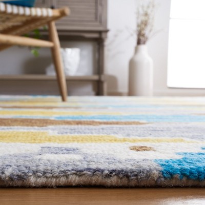 Blue and Ivory Hand-Tufted Wool Area Rug