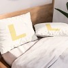 Deny Designs Standard April Lane Art Block Yellow Monogram L Microfiber Printed Pillow Sham - 2 of 3