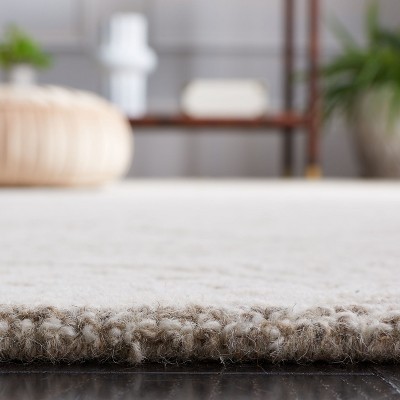 Natural Ivory Hand-Tufted Wool Round Area Rug