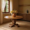 HomeRoots 58" Brown Solid Wood Pedestal Base Round Top Dining Table - 2 of 4