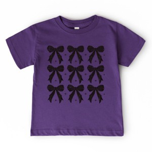 The Juniper Shop Coquette Black Bows Collage Distressed Toddler Short Sleeve Tee - 1 of 4