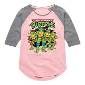 Girls' - Teenage Mutant Ninja Turtles - Group Logo Brick Wall Shirt Tail Raglan Graphic T-shirt - 1 of 3