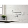 Compact Foldable Design: Wall-Mounted Dual-Handle Faucet with 360-Degree Rotation for Enhanced Flexibility and Space Saving - 2 of 3