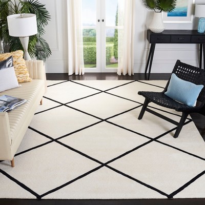 Ivory and Black Hand-Tufted Wool Area Rug 6' x 9'