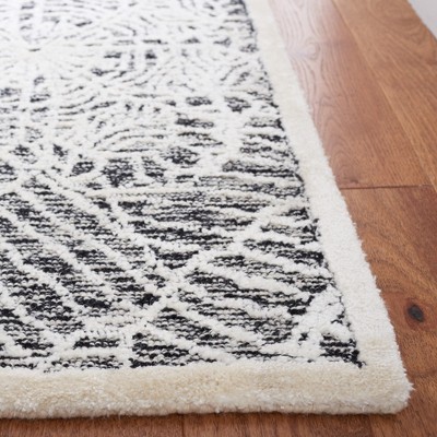 Hand-Tufted Black and Ivory Wool Square Rug