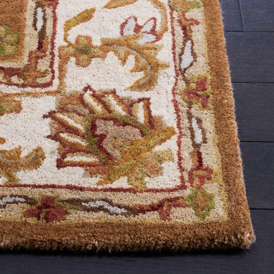 Elegant Heritage Ivory Wool 3' x 5' Hand-Tufted Area Rug