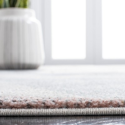 Ivory and Pink Geometric Floral 4' x 6' Synthetic Area Rug