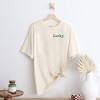 Simply Sage Market Women's Embroidered Lucky Typewriter Short Sleeve Garment Dyed Tee - 3 of 3