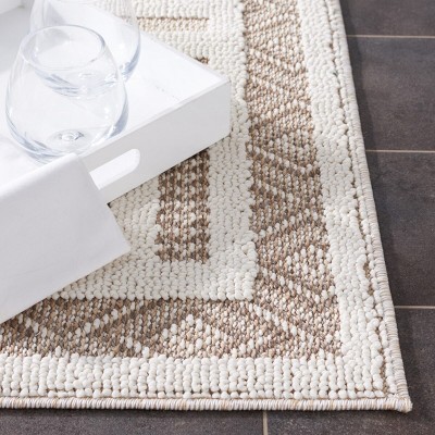 Ivory Boho-Chic 63" All-Weather Area Rug with Subtle Motifs