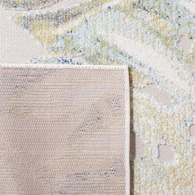 Light Green and Ivory Floral Synthetic Area Rug