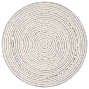 Ebony EBN811 Hand Tufted Indoor Rugs - Safavieh - 1 of 4