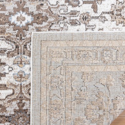 Ivory and Beige Tufted Rectangular Synthetic Area Rug 5' x 7'