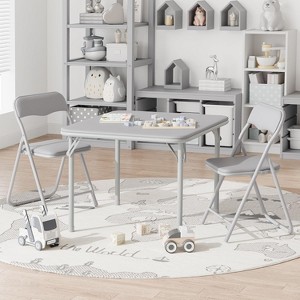 Children's folding table and chair set, one table and two chairs, with PU cushions, easy to place, suitable for children to eat, read and play - 1 of 4