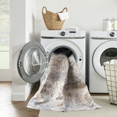 Ivory Abstract Synthetic 3'3" x 5' Easy-Care Area Rug