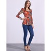 INSPIRE CHIC Women's Long Sleeves Padded Shoulder Scoop Neck Printed Peplum Shirt - 3 of 4