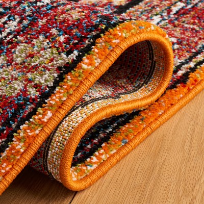 Vintage Orange and Black Synthetic 4' x 6' Area Rug