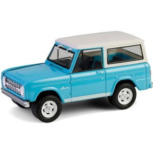 1966 Ford Bronco Custom SUV Turquoise Blue with White Top "Barrett-Jackson" Series 15 1/64 Diecast Model Car by Greenlight - 1 of 1