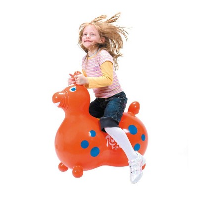 riding a toy horse