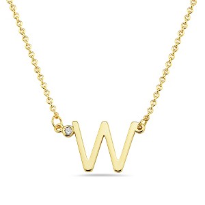 Stylish 14k gold plated initial necklace adorned with sparkling cubic zirconia for a personalized and elegant touch. - 1 of 2