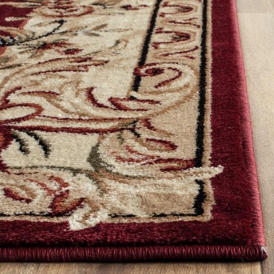 Red and Ivory Floral Synthetic 6' x 9' Area Rug