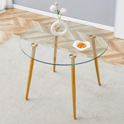 Lovmor Round dining table with glass top, silver metal legs,the silver legs show an extraordinary texture