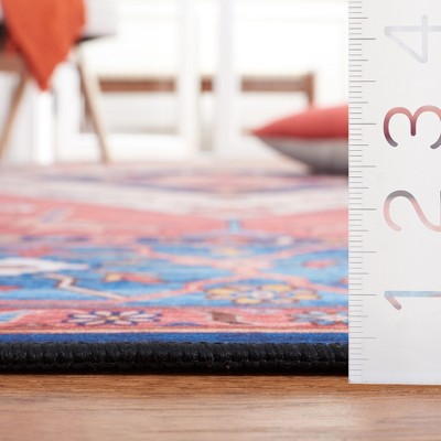Tucson 6' x 9' Blue and Rust Synthetic Area Rug