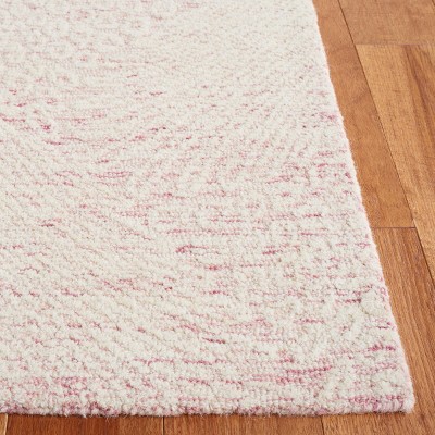 Ebony 5' x 8' Pink and Ivory Hand Tufted Wool Area Rug