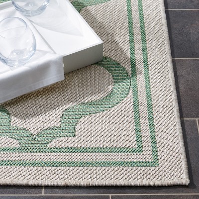 Geometric Elegance 59'' Synthetic Indoor/Outdoor Area Rug
