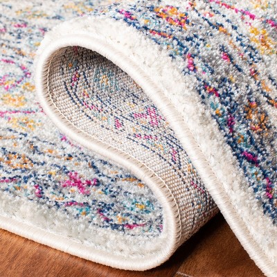 8' x 10' Cream and Fuchsia Synthetic Reversible Area Rug