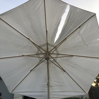 Threshold 75lb 11 ft cantilever round offset best sale patio umbrella with base azure set target $379