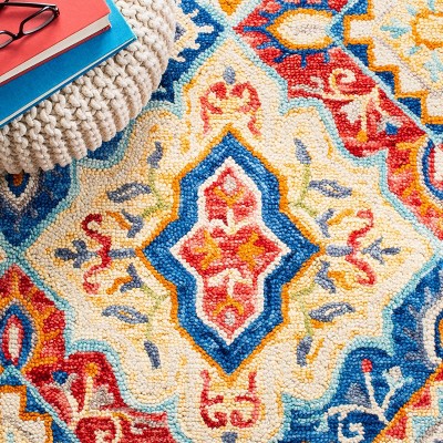 Classy-Casual Blue Wool 9' x 12' Hand-Tufted Rectangular Rug