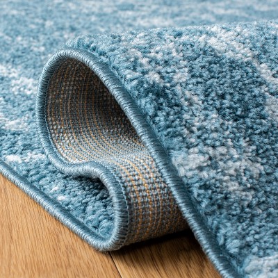 Turquoise Blue Synthetic Rectangular Boho Area Rug 5'3" x 7'6"