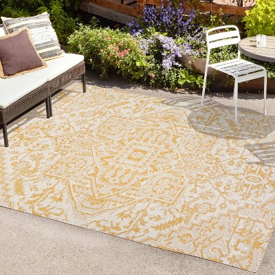 4' x 6' Cream and Yellow Synthetic Bohemian Medallion Area Rug