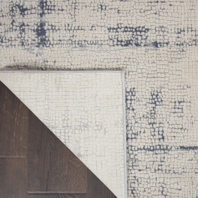 Modern Abstract Ivory & Blue Synthetic Area Rug 7'10" x 10'6"