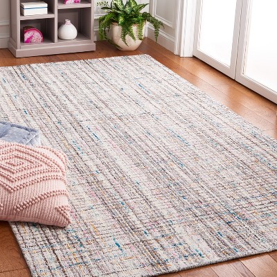 Handmade Tufted Red Abstract Wool Rectangular Rug