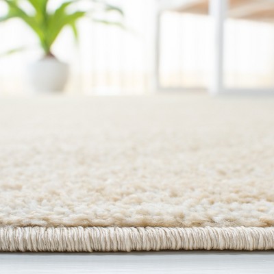 Green and Ivory Hand-knotted Synthetic 6' x 9' Area Rug